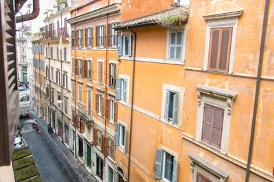 a view of an alley in an old building at Relais Rasella 47 in Rome