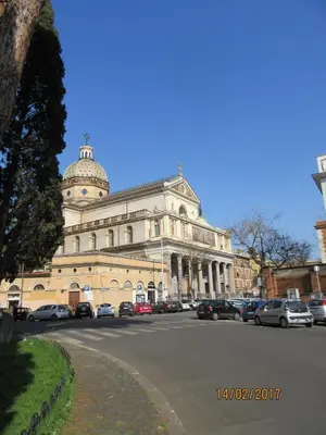 a large building with a tower on top of it at Alloggio Quiriti in Rome