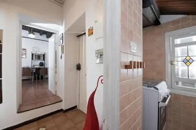 a hallway with a door leading to a dining room at Al Cedro in Rome