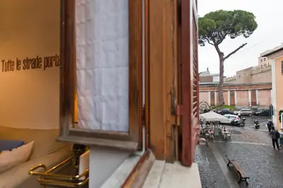 an open window with a view of a city street at BoRooms in Rome