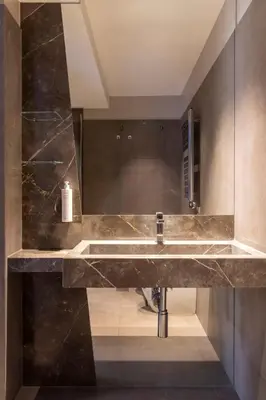 a bathroom with a sink and a mirror at BDB Rooms Navona in Rome