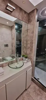 a bathroom with a sink and a bath tub at Fornaci Guest House in Rome