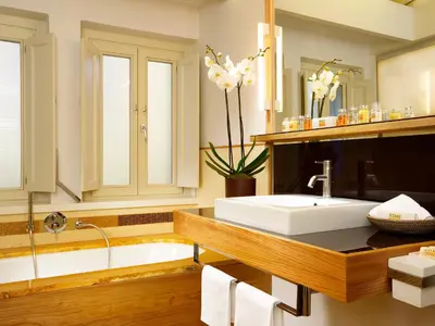 a bathroom with a sink and a bath tub at Mario De' Fiori 37 in Rome
