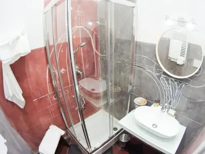 a bathroom with a shower and a sink at L'architetto in Rome