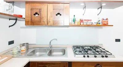 a kitchen with a sink and a stove at Parioli House near Borghese-LUISS University in Rome