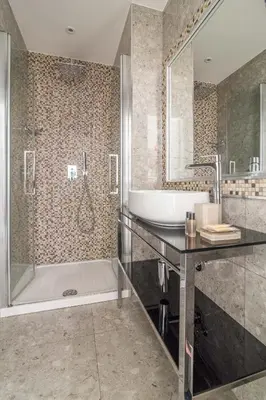 a bathroom with a tub and a sink and a shower at Vatican Relais Rome Suite in Rome