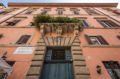 a building with a planter above a door at Piazza Farnese exclusive view 2 bedroom en suite in Rome