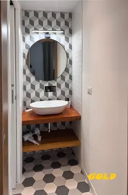 a bathroom with a sink and a mirror at Albornoz 35 in Rome