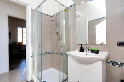 a bathroom with a shower and a sink at Piazza Capponi Apartment in Rome