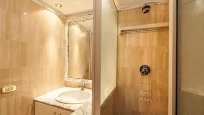 a bathroom with a sink and a shower at Rental in Rome - Gambero Suite in Rome
