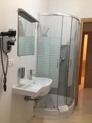 a bathroom with a sink and a shower at A Casa Di Penelope in Rome