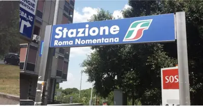 a sign for arazeneca sign in front of a building at Casa Dino rooms in Rome