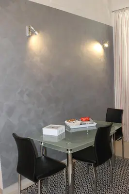a meeting room with a table and chairs at Rome Veniero WelcomeHouse in Rome