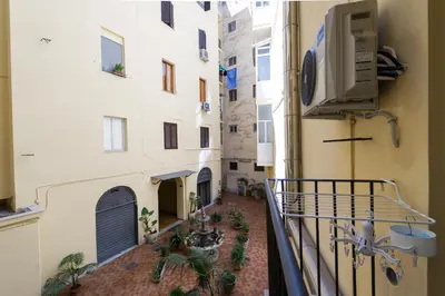 a balcony of a building with plants on it at Ottaviano Exclusive Maison in Rome