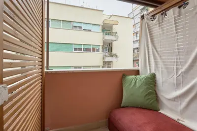a balcony with a couch and a window at Interno 9 a San Pietro in Rome