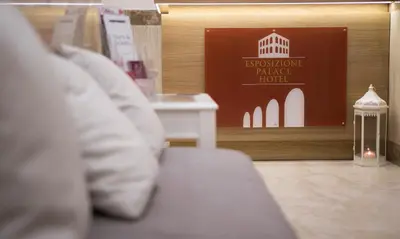 a bench in a store with a sign in the window at Esposizione Palace Hotel in Rome