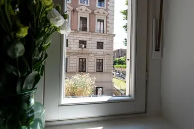 a window with a view of a building at Guest House Al Conservatorio in Rome
