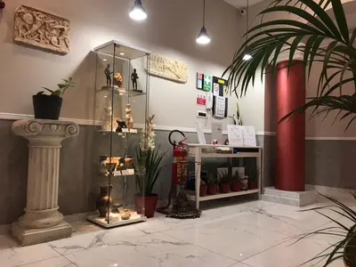 a shop with a display case with plants and figurines at Ann Inn in Rome