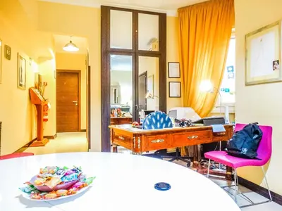 a room with a desk and a bowl of food at B&B Morelli 1 in Rome