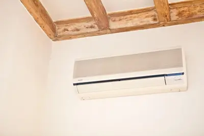 a window with a air conditioner on a wall at Piazza Argentina/Pantheon in Rome
