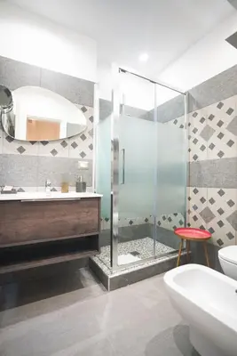 a bathroom with a shower and a sink and a toilet at Verrazzano 37 Guest House in Rome