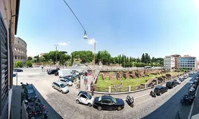 a bunch of cars parked in a parking lot at Royal House in Rome