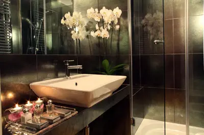 a bathroom with a sink and a bath tub at St. Peter Guest House in Rome