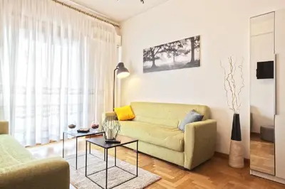 a living room with a couch and a table at Vatican's Sight in Rome