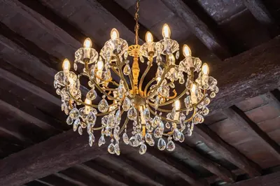 a large chandelier hanging from a ceiling at Trastevere Casa Renella 92 in Rome