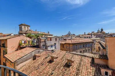 an aerial view of a city with roofs at BB Il Re Alla Reginella Guest House in Rome