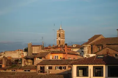 a view of a city with a clock tower at BB Il Re Alla Reginella Guest House in Rome