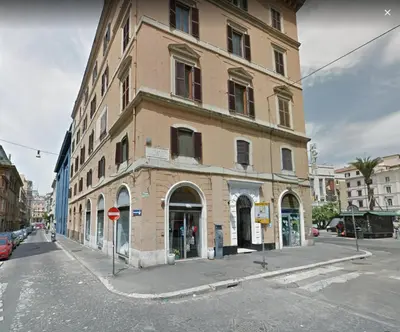 a large brick building on a city street at Opera House in Rome