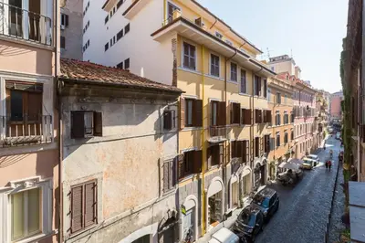 a view of a street with buildings and cars at Monti Colosseum apartment in Rome