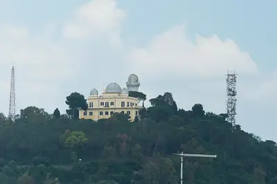 a house on top of a hill with trees at San Peter Raffy's House in Rome