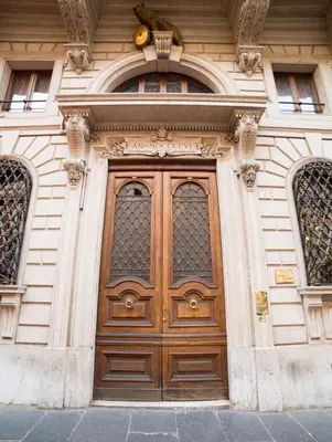 a large wooden door on a building at Affreschi Su Roma Luxury B&B in Rome