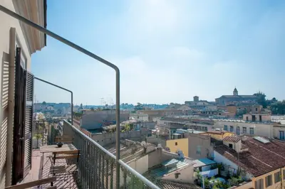 a view of a city from the balcony of a building at Monti Deluxe - Terrace Spectacular View in Rome