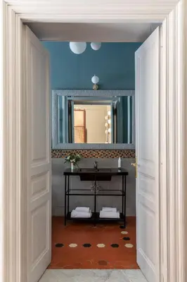 a bathroom with a sink and a mirror at Glance in Rome in Rome