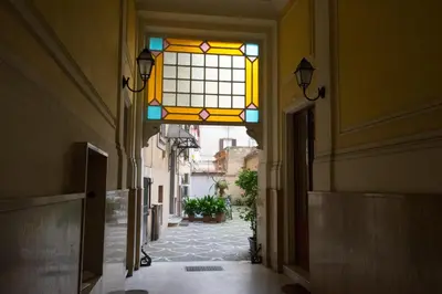 an alley with a stained glass window in a building at Quo Vadis Roma 2 in Rome