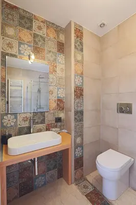 a bathroom with a sink and a toilet at DaVinci Relais Guest House in Rome