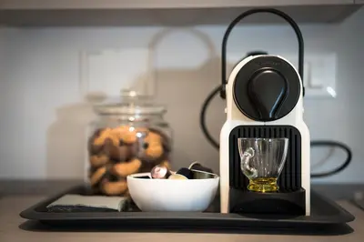 a blender sitting on a counter with a bowl of food at Laura Family Apartments in Rome
