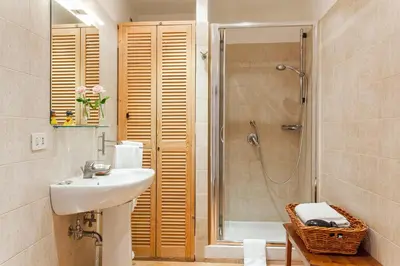 a bathroom with a sink and a shower at Gli Artisti Apartments Rome in Rome