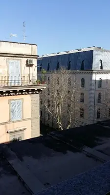 a building with a solar roof on top of it at Sun Moon in Rome