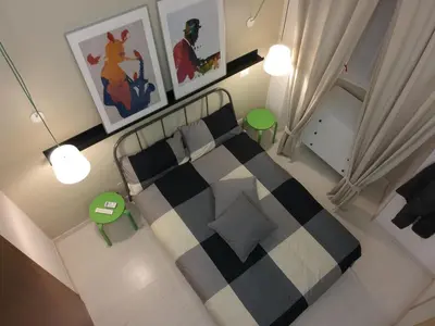 an overhead view of a bedroom with a bed at The yellow house in Rome