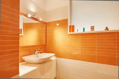 a bathroom with a sink and a mirror at Vatican Luxury Penthouse with Terrace in Rome