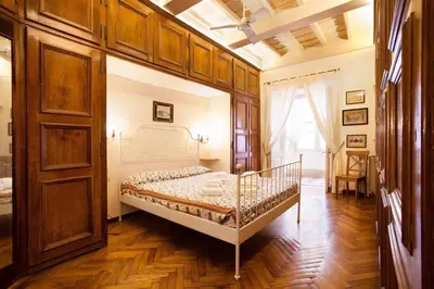 a bedroom with a large bed in a room at Passeggiata di Ripetta in Rome