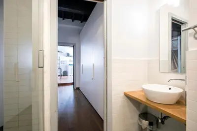 a bathroom with a sink and a mirror at AndreaSuite - Piazza Navona in Rome