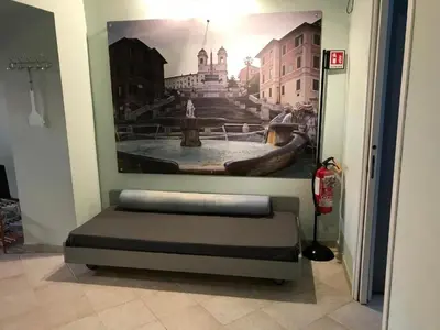 a bedroom with a large bed with towels on it at Piazza di Spagna Prestige in Rome