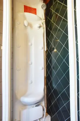 a shower with a white toilet in a bathroom at Domus Rotundae Pantheon in Rome