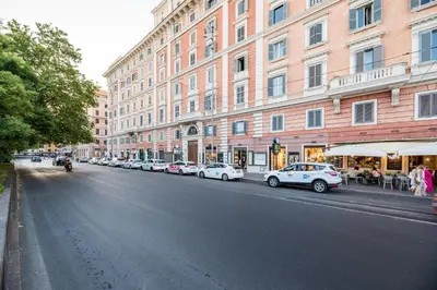 a street with cars parked on the side of a building at Suite 36 in Rome