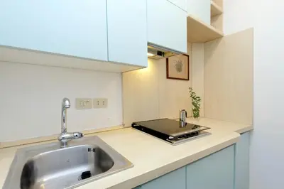 a kitchen with a sink and a counter top at Characteristic apartment just beside the Vatican in Rome